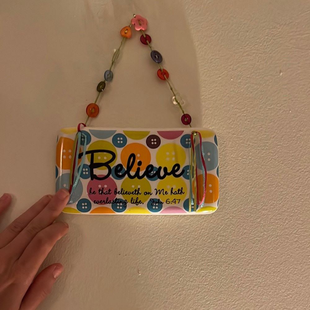 A cute piece to hang on the wall, bathroom, really anywhere with a cute quote.
